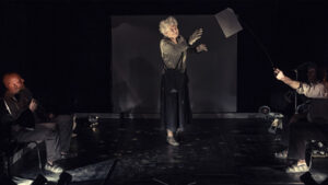woman catches paper