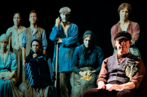 a group of people in old fashion clothes