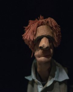 man hand doll woth red hair