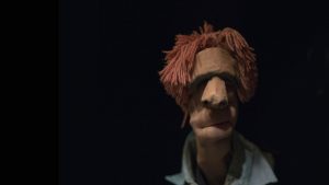 man hand doll woth red hair